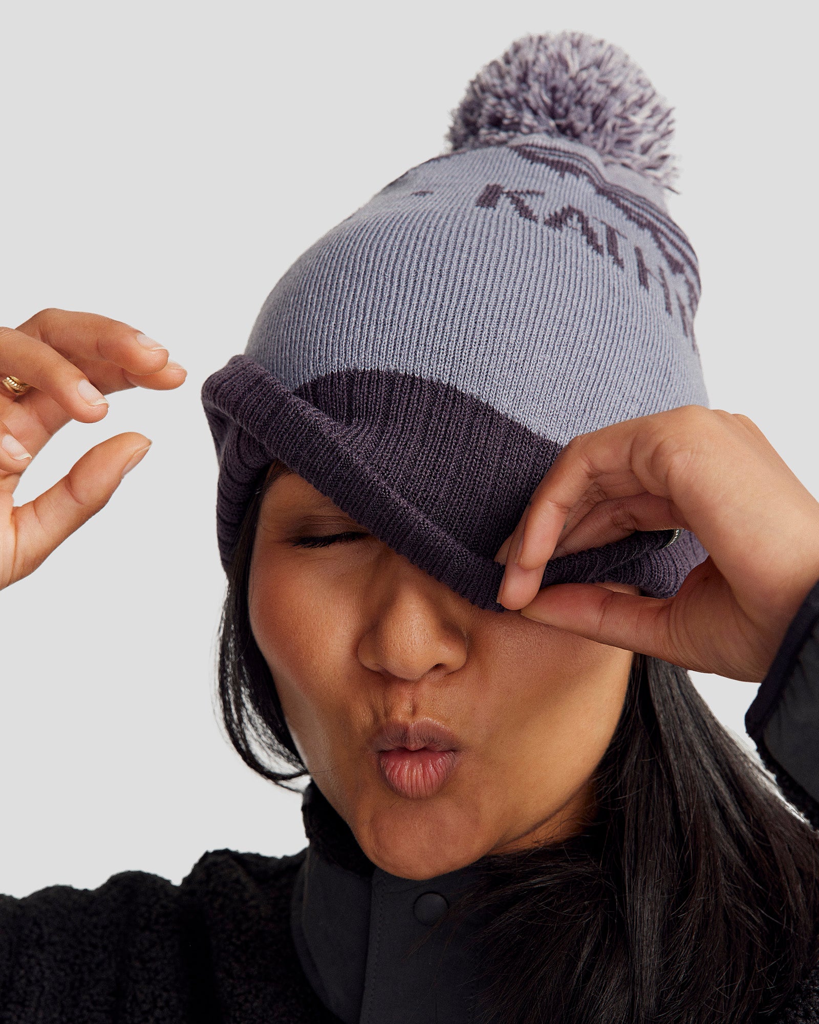 b0618_oqu_mtn_skies_pompom_beanie_c_1743629206000