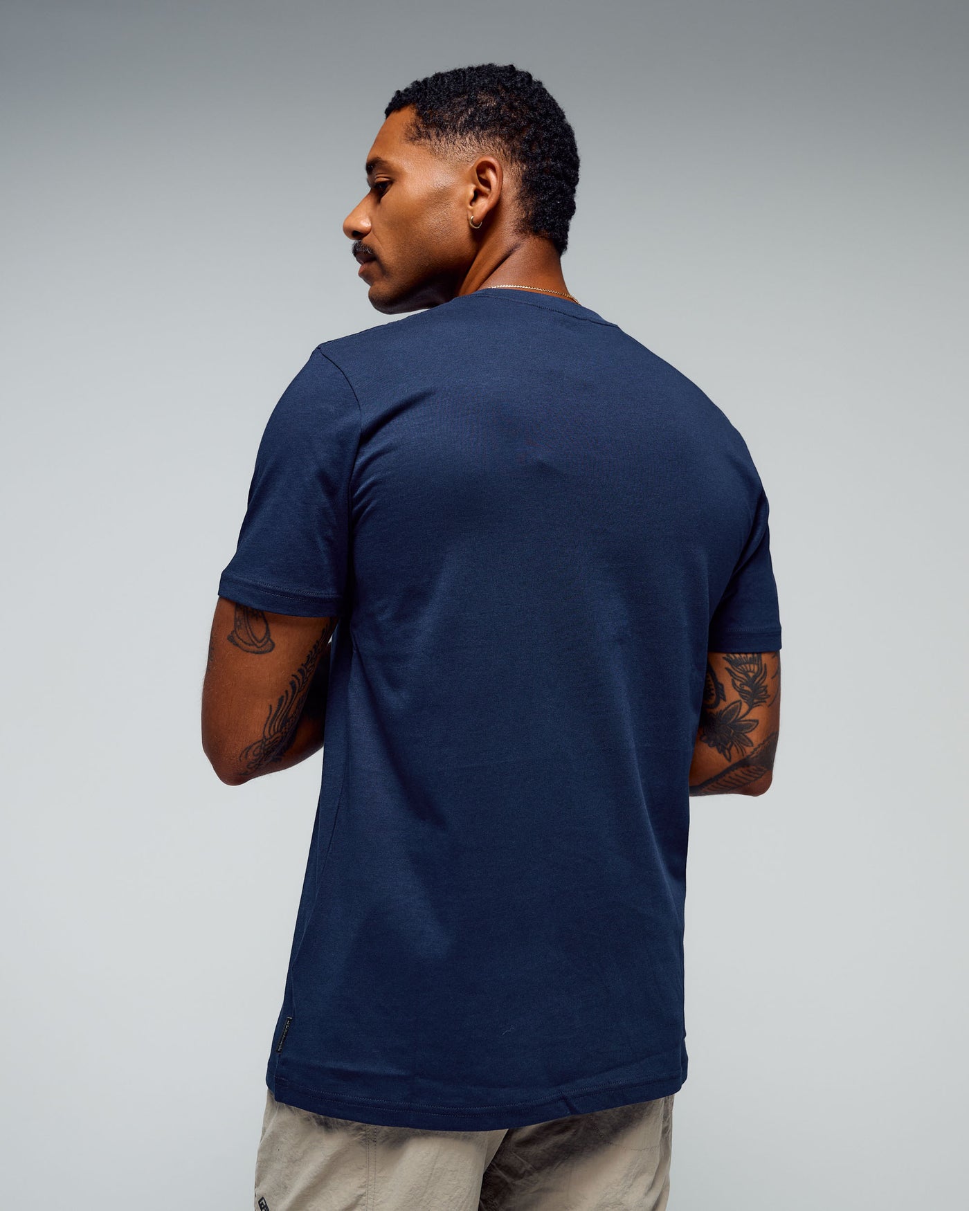 b0995_893_mens_kathmandu_logo_70s_organic_cotton_tshirt_c_1768348925000